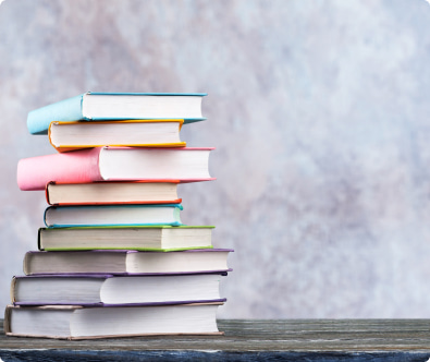 Books stacked on top of one another
