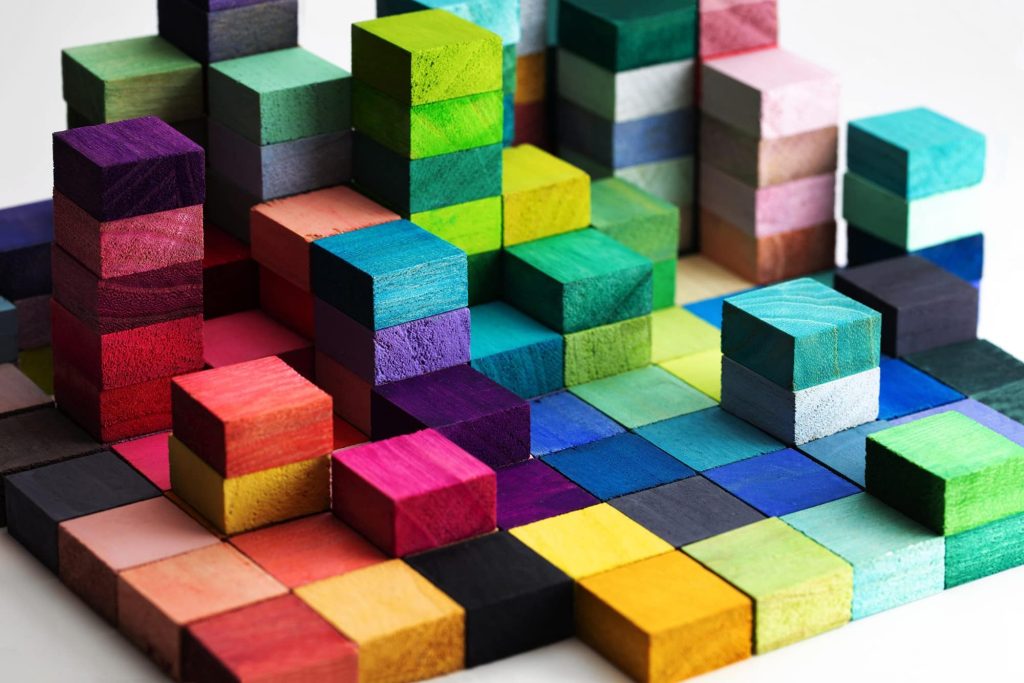 Spectrum of stacked multicoloured wooden blocks