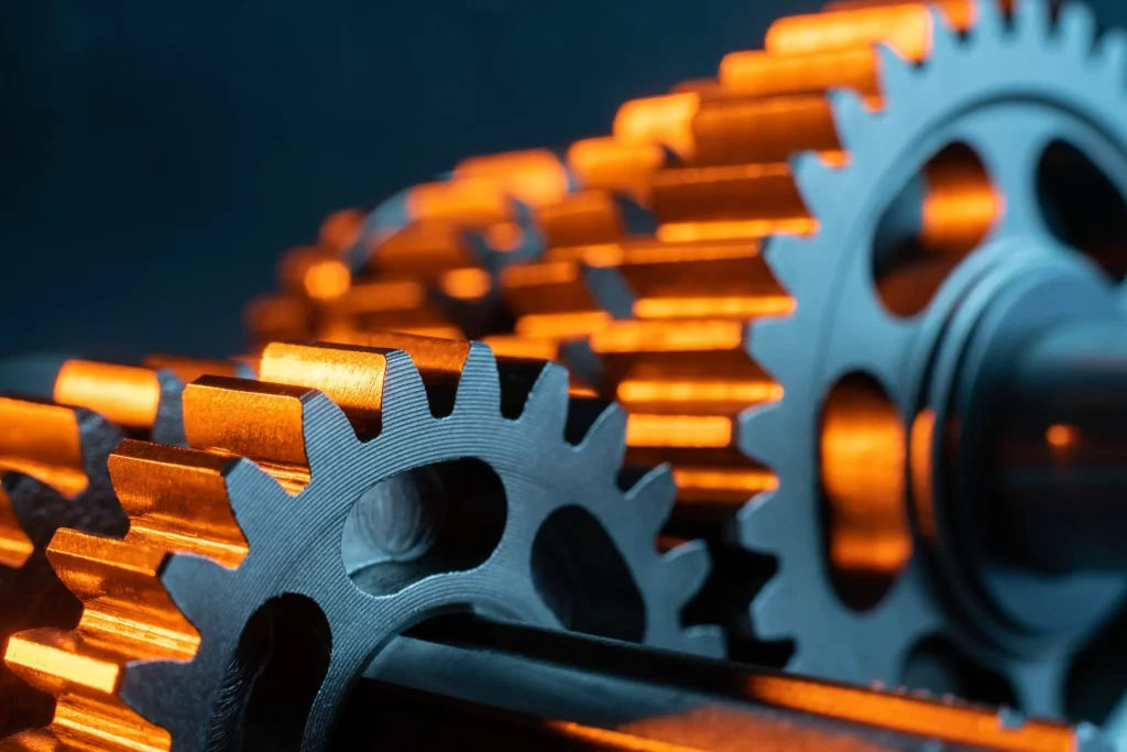 Interlocking orange and black gears