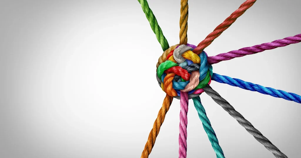 Colourful ropes tied together in a central knot