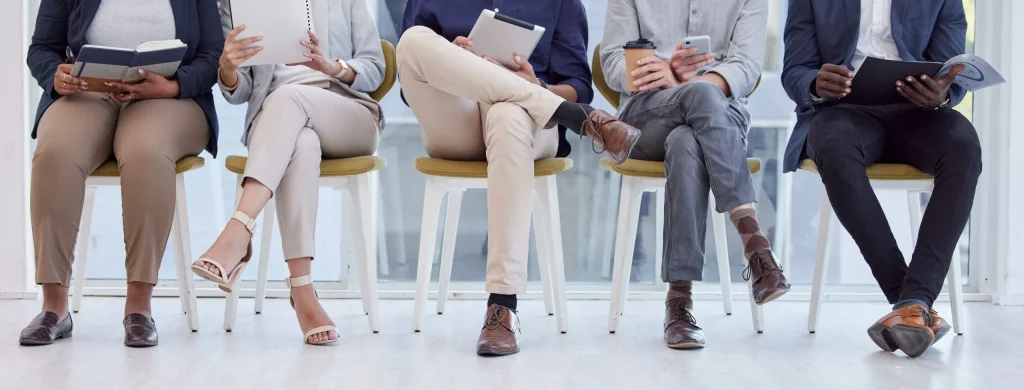 People seated in a waiting room