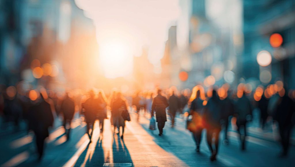 Busy City Street At Sunset Silhouettes Of People Walking